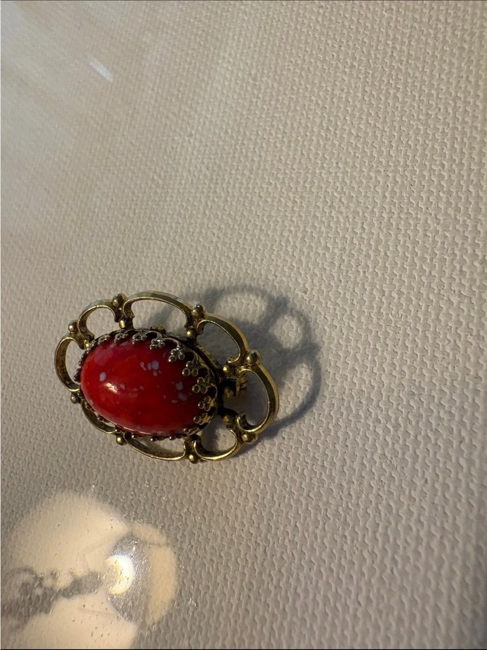Vintage freirich gold tone orange speckled cabochon brooch